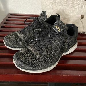 APL shoes, gold and black